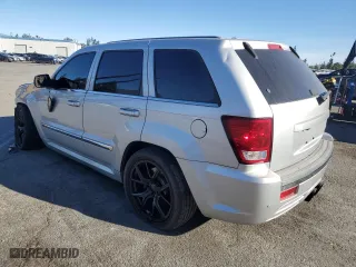 2007 Jeep Grand Cherokee SRT-8 with VIN 1J8HR78327C662597, listed as a Copart auction lot 85585864 with 184,430 mi miles and Salvage Title. Bid and sale history available at carsss.com. Image 2.
