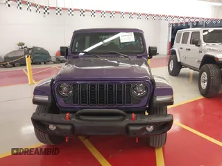 2023 Jeep Wrangler High Altitude z VIN 1C4HJXEN9PW560958, wystawiony jako IAAI lot #42393559 z przebiegiem 35 981 mil mil oraz . Historia ofert i sprzedaży dostępna na DreamBid. Obrazek 13.