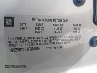 2007 Saturn Aura XR with VIN 1G8ZV57767F307098, listed as a IAAI auction lot 42050113 with 90,368 mi miles. Bid and sale history available at carsss.com. Image 9.