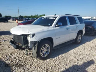 2015 Chevrolet Tahoe LS with VIN 1GNSCAKC8FR121612, listed as a Copart auction lot 56363785 with 239,214 mi miles and Salvage title. Bid and sale history available at DreamBid. Image 1.
