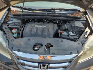 2007 Honda Odyssey LX z VIN 5FNRL38257B011710, wystawiony jako Copart lot #61163265 z przebiegiem 196 575 mil mil oraz Czysty tytuł • Clean title. Historia ofert i sprzedaży dostępna na DreamBid. Obrazek 12.