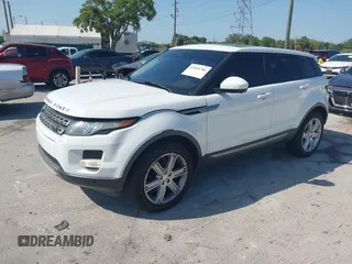 2015 Land Rover Range Rover Evoque Pure Premium z VIN SALVR2BG0FH964683, wystawiony jako IAAI lot #42016766 z przebiegiem 94 942 mil mil oraz . Historia ofert i sprzedaży dostępna na DreamBid. Obrazek 2.