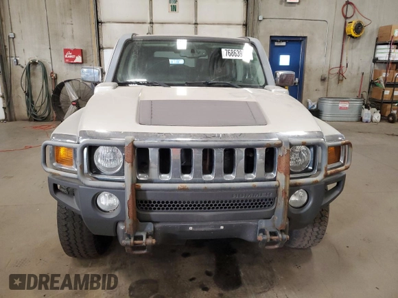2007 Hummer H3 SUV with VIN 5GTDN13E778137599, listed as a Copart auction lot 76863904 with 210,810 mi miles and Salvage Title. Bid and sale history available at DreamBid. Image 5.