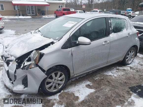 2015 Toyota Yaris L with VIN VNKKTUD32FA017551, listed as a IAAI auction lot 41267892 with 122,506 mi miles. Bid and sale history available at carsss.com. Image 2.
