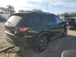 2023 Honda Pilot Touring with VIN 5FNYG2H77PB006594, listed as a Copart auction lot 83662854 with 37,637 mi miles and Salvage Title. Bid and sale history available at DreamBid. Image 3.