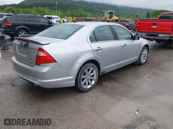 2012 Ford Fusion SEL with VIN 3FAHP0JG6CR191735, listed as a IAAI auction lot 42365977 with 128,023 mi miles and . Bid and sale history available at DreamBid. Image 4.