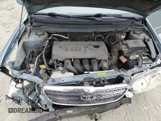 2006 Toyota Corolla CE with VIN 1NXBR32E26Z585721, listed as a Copart auction lot 52023485 with 102,856 mi miles and Salvage Title. Bid and sale history available at DreamBid. Image 12.