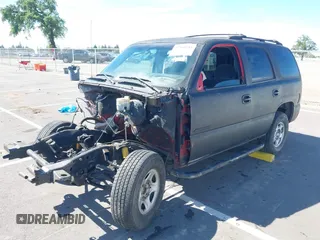 2002 Chevrolet Tahoe LS with VIN 1GNEC13T12R214901, listed as a IAAI auction lot 41868281 with Not provided miles and . Bid and sale history available at DreamBid. Image 2.