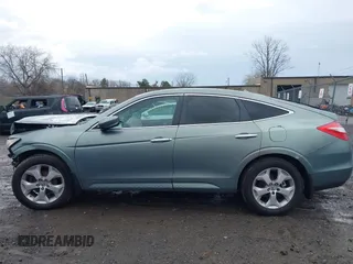 2012 Honda Crosstour EX-L z VIN 5J6TF2H56CL003893, wystawiony jako IAAI lot #41917798 z przebiegiem 205 050 mil mil oraz . Historia ofert i sprzedaży dostępna na DreamBid. Obrazek 14.