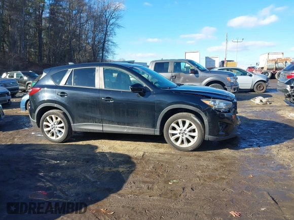 2014 Mazda CX-5 Grand Touring with VIN JM3KE4DY1E0303658, listed as a IAAI auction lot 41536769 with 158,777 mi miles. Bid and sale history available at carsss.com. Image 12.