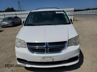 2014 Dodge Grand Caravan SXT z VIN 2C4RDGCG1ER433319, wystawiony jako Copart lot #55533885 z przebiegiem 146 550 mil mil oraz Czysty tytuł • Clean title. Historia ofert i sprzedaży dostępna na DreamBid. Obrazek 5.