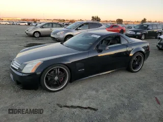 2004 Cadillac XLR z VIN 1G6YV34A445602565, wystawiony jako Copart lot #84011204 z przebiegiem Nie podano mil oraz Tytuł czysty. Historia ofert i sprzedaży dostępna na DreamBid. Obrazek 1.