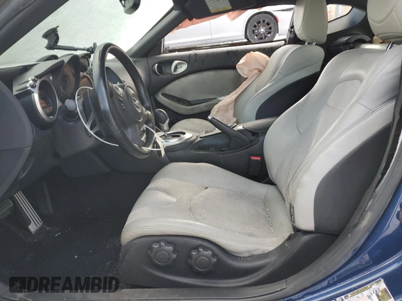 2013 Nissan 370Z z VIN JN1AZ4EH4DM383023, wystawiony jako Copart lot #88204985 z przebiegiem 138 112 mil mil oraz Szkoda całkowita • Salvage title. Historia ofert i sprzedaży dostępna na DreamBid. Obrazek 7.