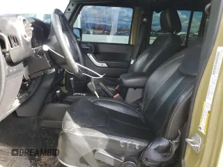 2013 Jeep Wrangler Unlimited Rubicon 10th Anniversary with VIN 1C4HJWFG4DL549065, listed as a Copart auction lot 75899594 with 127,960 mi miles and Salvage title. Bid and sale history available at DreamBid. Image 7.