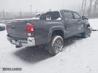 2019 Toyota Tacoma 4WD SR with VIN 3TMCZ5AN6KM283675, listed as a IAAI auction lot 41245232 with 35,337 mi miles. Bid and sale history available at carsss.com. Image 4.