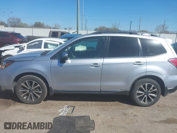 2017 Subaru Forester Touring with VIN JF2SJGTC9HH409665, listed as a IAAI auction lot 41749546 with 118,635 mi miles. Bid and sale history available at carsss.com. Image 14.