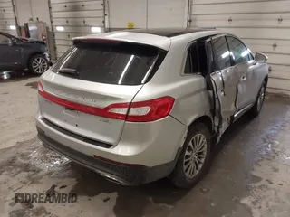 2017 Lincoln MKX Select with VIN 2LMPJ8KR5HBL30586, listed as a IAAI auction lot 41749741 with 64,172 mi miles. Bid and sale history available at carsss.com. Image 4.