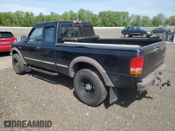 1997 Ford Ranger XLT with VIN 1FTDR15X9VTA24287, listed as a Copart auction lot 54923325 with 148,921 mi miles and Salvage Title. Bid and sale history available at DreamBid. Image 2.