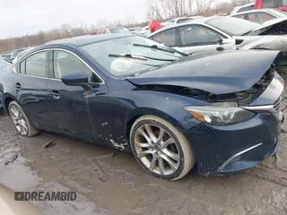 2016 Mazda Mazda6 i Touring with VIN JM1GJ1T54G1434497, listed as a IAAI auction lot 41654012 with 133,901 mi miles. Bid and sale history available at carsss.com. Image 13.