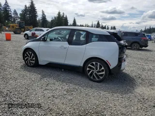 2017 BMW i3 z VIN WBY1Z8C32HV890898, wystawiony jako Copart lot #57968095 z przebiegiem 76 806 mil mil oraz Szkody całkowita. Historia ofert i sprzedaży dostępna na DreamBid. Obrazek 2.