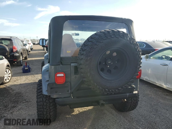 1997 Jeep Wrangler Sport with VIN 1J4FY19S5VP520801, listed as a Copart auction lot 75301274 with Not Provided miles and Non Repairable. Bid and sale history available at carsss.com. Image 6.