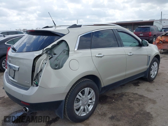 2014 Cadillac SRX Luxury Collection z VIN 3GYFNBE31ES628346, wystawiony jako IAAI lot #41709425 z przebiegiem 47 634 mil mil oraz . Historia ofert i sprzedaży dostępna na DreamBid. Obrazek 4.