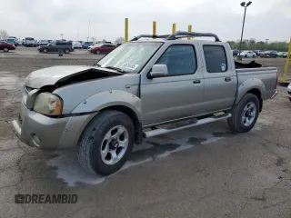 2004 Nissan Frontier LE z VIN 1N6ED27T14C460890, wystawiony jako Copart lot #55610435 z przebiegiem 218 988 mil mil oraz Szkody całkowita. Historia ofert i sprzedaży dostępna na DreamBid. Obrazek 1.