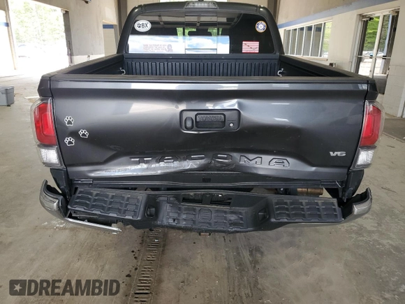 2021 Toyota Tacoma SR with VIN 3TMCZ5ANXMM425903, listed as a Copart auction lot 57963425 with 61,458 mi miles and Salvage title. Bid and sale history available at DreamBid. Image 6.