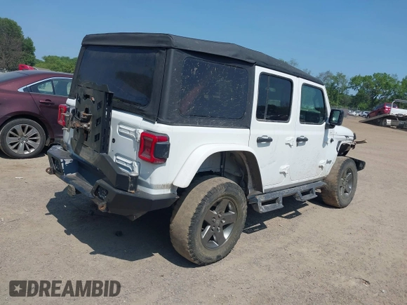 2018 Jeep Wrangler Unlimited Sport S with VIN 1C4HJXDGXJW146873, listed as a IAAI auction lot 42404813 with 73,929 mi miles and . Bid and sale history available at DreamBid. Image 4.