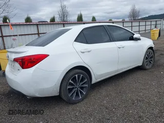 2019 Toyota Corolla L with VIN 5YFBURHE1KP937059, listed as a IAAI auction lot 41901278 with 98,796 mi miles and . Bid and sale history available at DreamBid. Image 4.