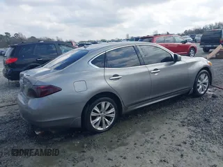 2011 Infiniti M with VIN JN1BY1AR2BM374001, listed as a IAAI auction lot 41544244 with 235,343 mi miles and . Bid and sale history available at DreamBid. Image 4.