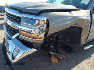 2017 Chevrolet Silverado 1500 LT with VIN 3GCUKREC2HG173402, listed as a IAAI auction lot 42041848 with 40,358 mi miles and . Bid and sale history available at DreamBid. Image 6.