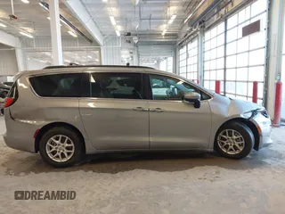 2021 Chrysler Voyager LXi with VIN 2C4RC1DG2MR506453, listed as a IAAI auction lot 41770938 with 90,255 mi miles and . Bid and sale history available at DreamBid. Image 13.