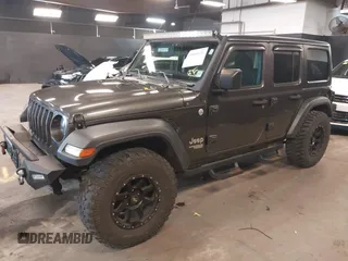 2018 Jeep Wrangler Unlimited Sport S с VIN 1C4HJXDG7JW280918, выставлен на аукционе IAAI как лот 41998831 с пробегом 66 539 миль миль и . История ставок и продаж доступна на DreamBid. Изображение 17.