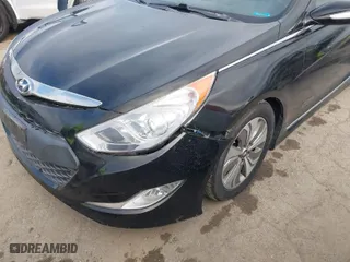 2014 Hyundai Sonata Hybrid with VIN KMHEC4A42EA103942, listed as a IAAI auction lot 41761495 with 150,895 mi miles. Bid and sale history available at carsss.com. Image 6.