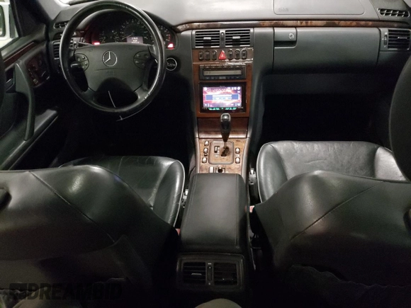 2001 Mercedes-Benz E 320/430 4 Matic with VIN WDBJF83J31X057905, listed as a Copart auction lot 50656425 with 155,217 mi miles and Salvage Title. Bid and sale history available at DreamBid. Image 8.