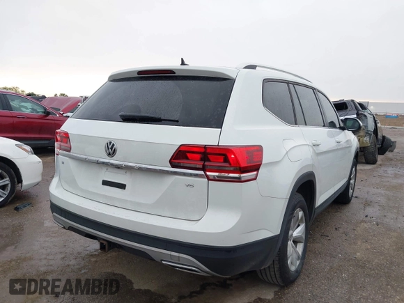 2018 Volkswagen Atlas SE с VIN 1V2DR2CA1JC587959, выставлен на аукционе IAAI как лот 42190292 с пробегом 93 832 миль миль и . История ставок и продаж доступна на DreamBid. Изображение 4.