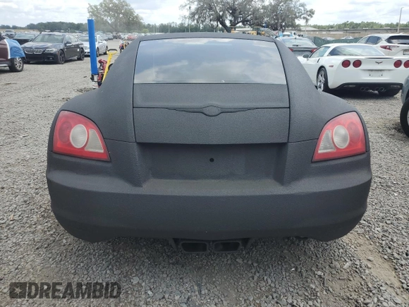 2004 Chrysler Crossfire z VIN 1C3AN69L84X014803, wystawiony jako Copart lot #56139015 z przebiegiem 102 523 mil mil oraz Szkoda całkowita • Salvage title. Historia ofert i sprzedaży dostępna na DreamBid. Obrazek 6.