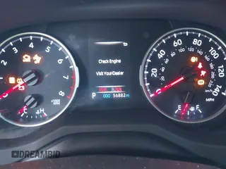 2019 Toyota RAV4 LE with VIN JTMH1RFV4KD037099, listed as a IAAI auction lot 41719515 with 56,882 mi miles. Bid and sale history available at carsss.com. Image 7.