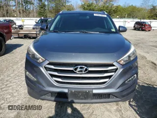 2017 Hyundai Tucson SE with VIN KM8J33A49HU485334, listed as a Copart auction lot 51931025 with 103,907 mi miles and Salvage Title. Bid and sale history available at DreamBid. Image 5.
