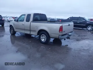 1999 Ford F-150 XL with VIN 1FTRX17L1XNA06282, listed as a IAAI auction lot 41545503 with 234,817 mi miles. Bid and sale history available at carsss.com. Image 3.