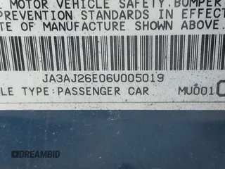 2006 Mitsubishi Lancer ES with VIN JA3AJ26E06U005019, listed as a IAAI auction lot 41381773 with 174,034 mi miles. Bid and sale history available at carsss.com. Image 9.