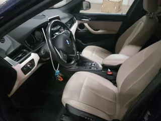 2019 BMW X1 xDrive28i with VIN WBXHT3C53K5L37533, listed as a Copart auction lot 71040942 with 44,237 mi miles. Bid and sale history available at carsss.com. Image 7.
