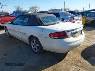 2005 Chrysler Sebring GTC with VIN 1C3EL75R55N613856, listed as a IAAI auction lot 41820747 with Not Provided miles and . Bid and sale history available at DreamBid. Image 3.