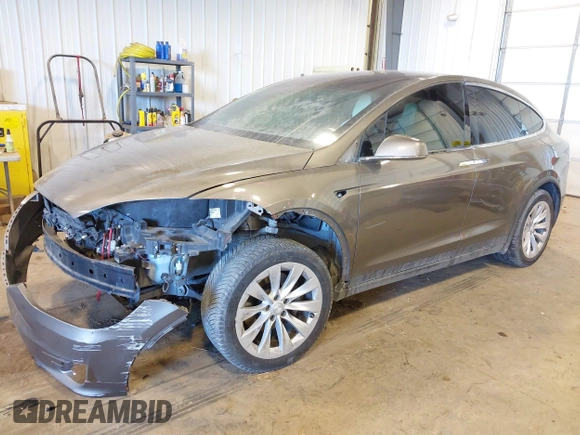 2016 Tesla Model X 70D with VIN 5YJXCBE27GF004974, listed as a IAAI auction lot 41630556 with 167,709 mi miles. Bid and sale history available at carsss.com. Image 20.