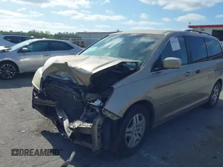 2005 Honda Odyssey EX with VIN 5FNRL38495B401742, listed as a IAAI auction lot 42133434 with 162,161 mi miles and . Bid and sale history available at carsss.com. Image 6.