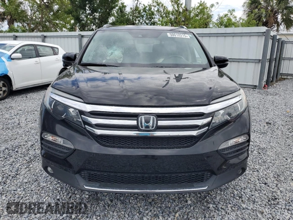2017 Honda Pilot Touring with VIN 5FNYF6H9XHB075468, listed as a Copart auction lot 50012215 with 90,718 mi miles and Salvage Title. Bid and sale history available at carsss.com. Image 5.