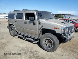 2005 Hummer H2 SUV with VIN 5GRGN23U85H113194, listed as a Copart auction lot 78012304 with 148,940 mi miles and Salvage Title. Bid and sale history available at carsss.com. Image 4.