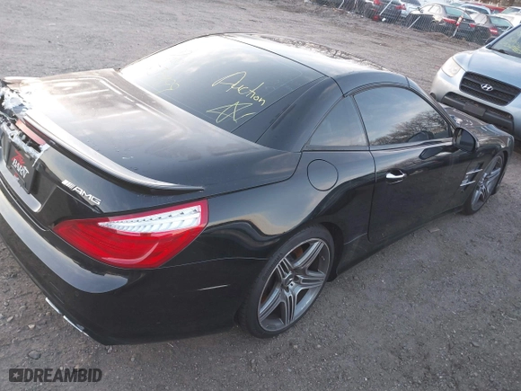 2013 Mercedes-Benz SL-Class SL 63 AMG with VIN WDDJK7EA8DF004394, listed as a IAAI auction lot 41766515 with 999,999 mi miles. Bid and sale history available at carsss.com. Image 4.