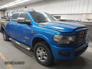 2020 Ram 2500 Laramie z VIN 3C6UR5FL4LG208430, wystawiony jako IAAI lot #41871063 z przebiegiem 68 970 mil mil oraz . Historia ofert i sprzedaży dostępna na DreamBid. Obrazek 1.